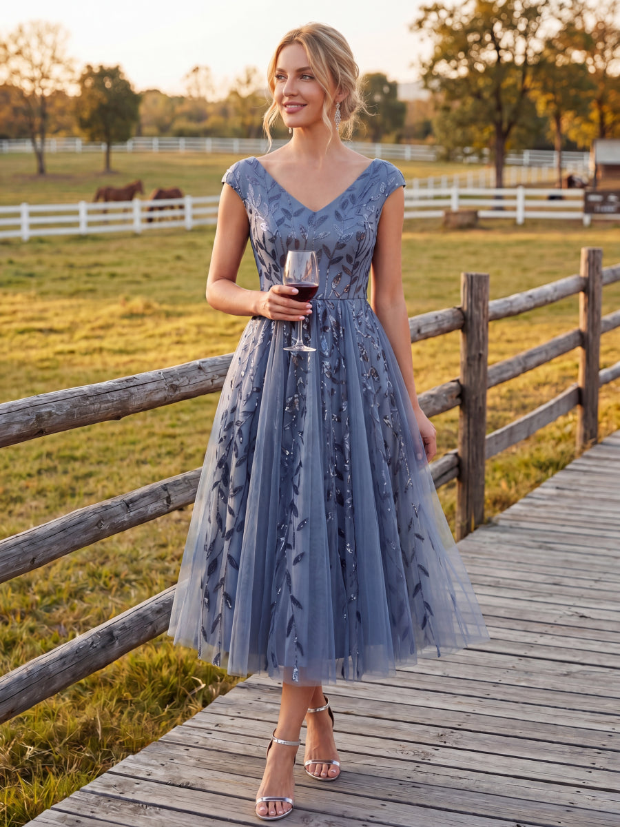 Robe midi sans manches col en V à sequins et coupe évasée #Couleur_Marine Fume