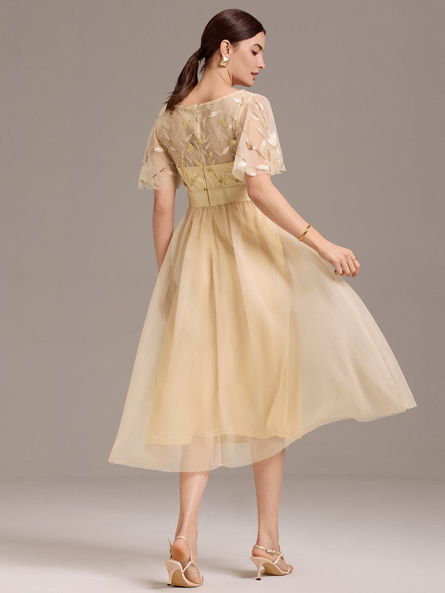 Robe d'invitée de mariage mi-longue à paillettes et feuilles #Couleur_Dorée