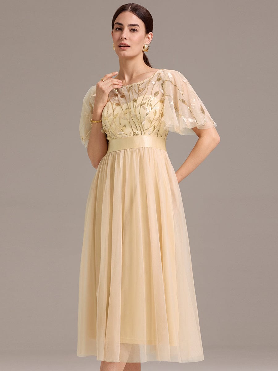 Robe d'invitée de mariage mi-longue à paillettes et feuilles #Couleur_Dorée
