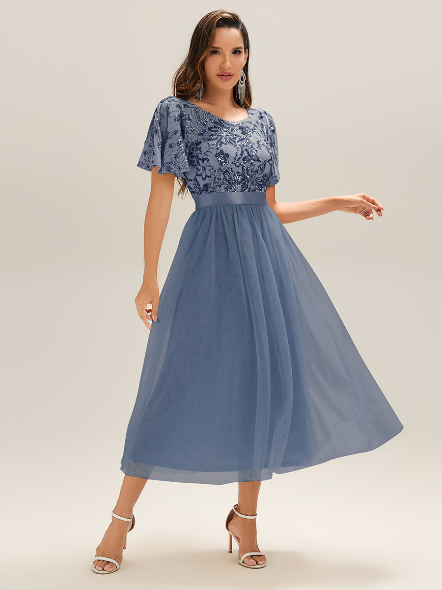 Robe de soirée à col en V profond et manches à volants et sequins #Couleur_Marine Fume