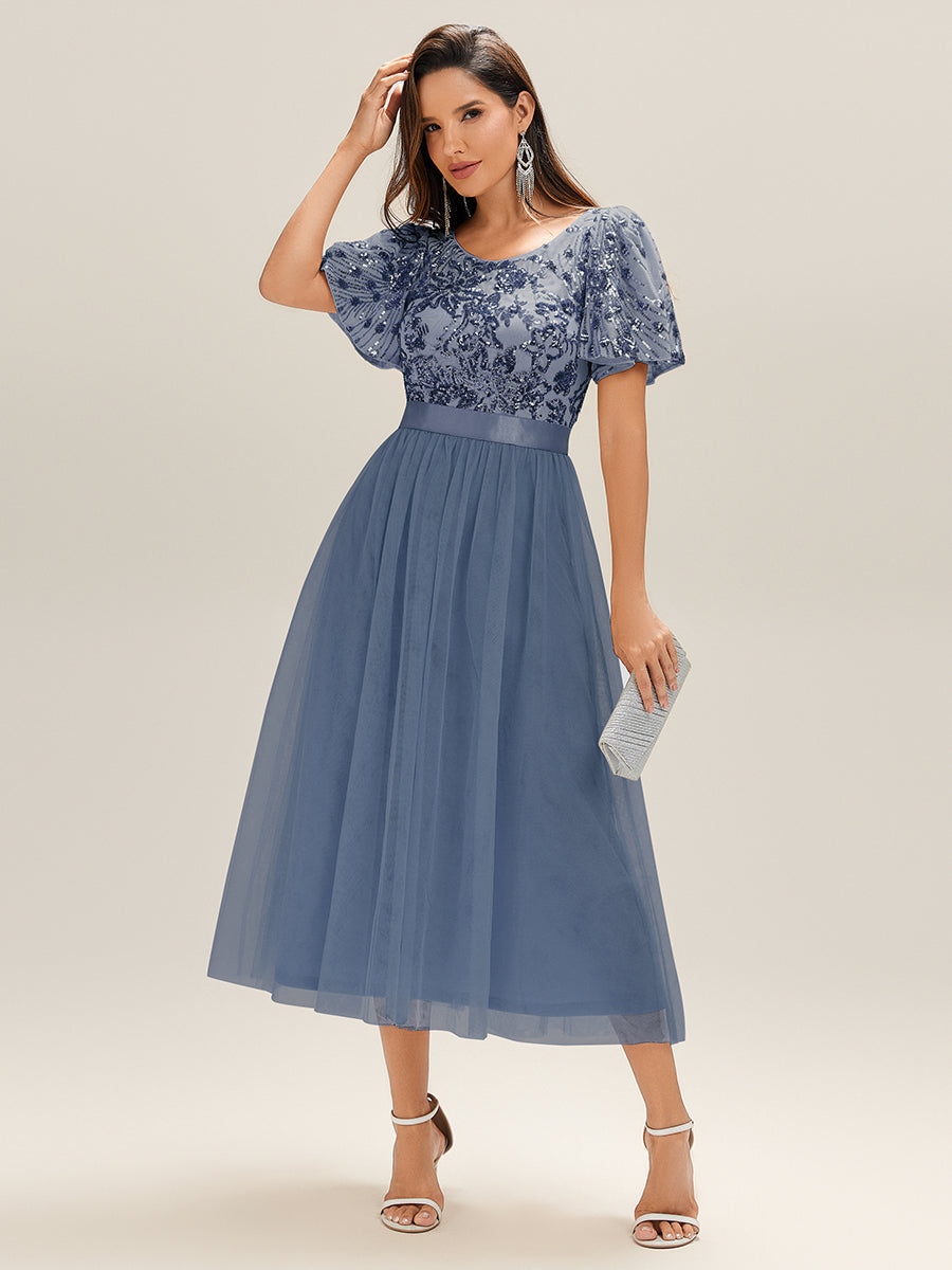 Robe de soirée à col en V profond et manches à volants et sequins #Couleur_Marine Fume