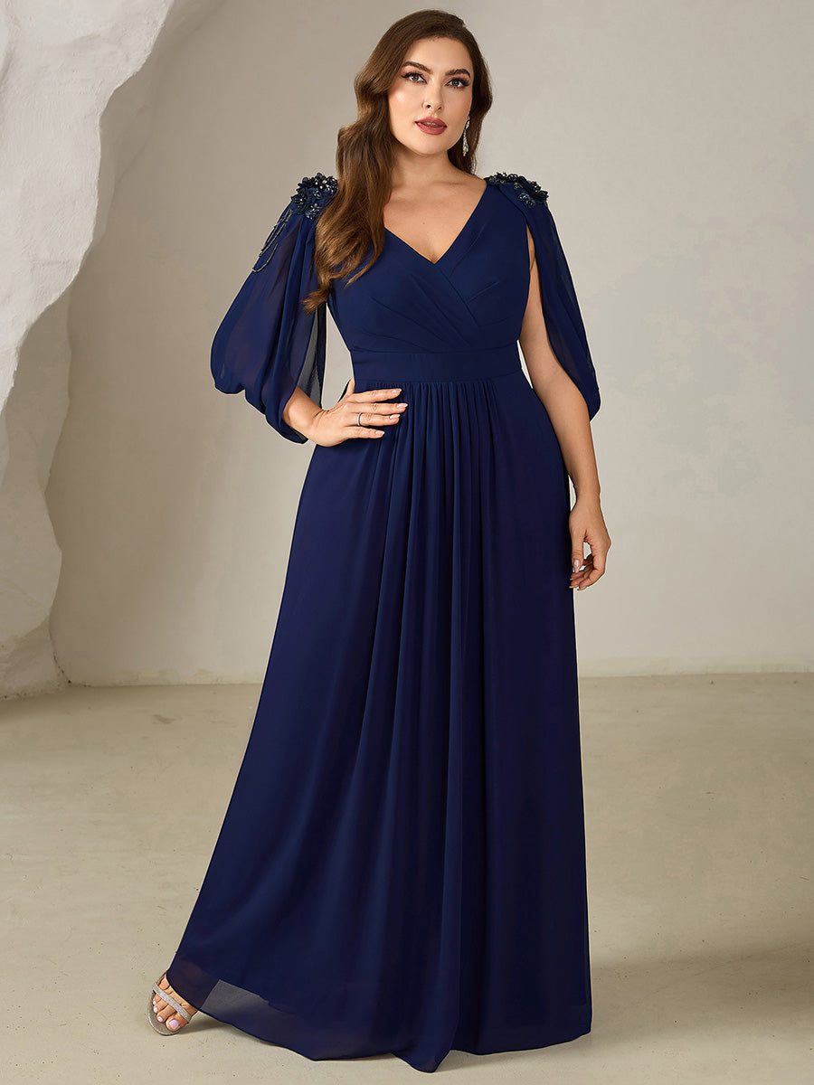 Robe de soirée chic à manches mi-longues en imprimé floral avec appliqués décolleté en V profond coupe A longueur de sol avec détails en perles #Couleur_Bleu Marine