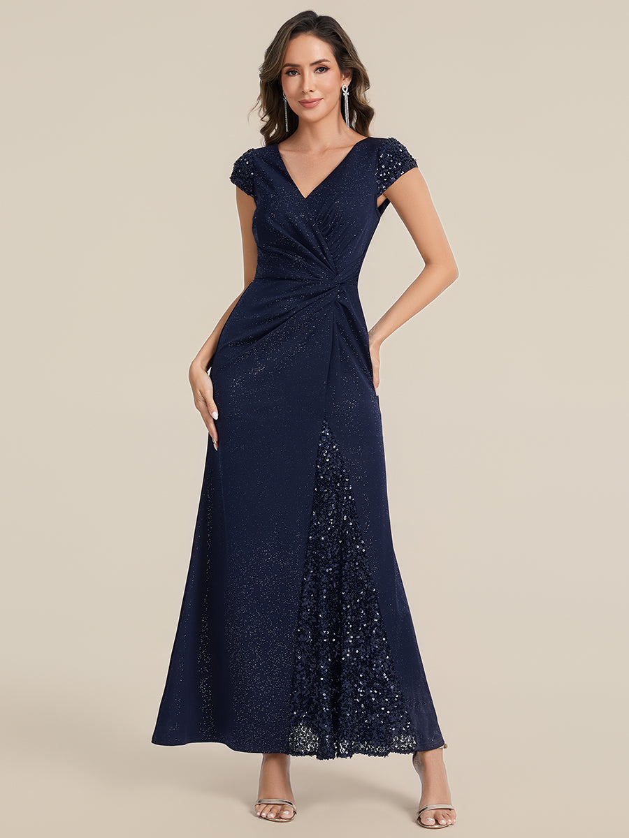 Robe moulante à manches courtes en stretch élevé avec décolleté en V noué et détails en sequins #Couleur_Bleu Marine