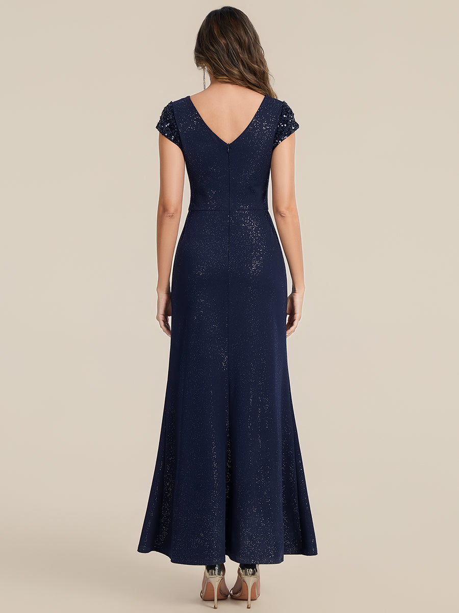 Robe moulante à manches courtes en stretch élevé avec décolleté en V noué et détails en sequins #Couleur_Bleu Marine