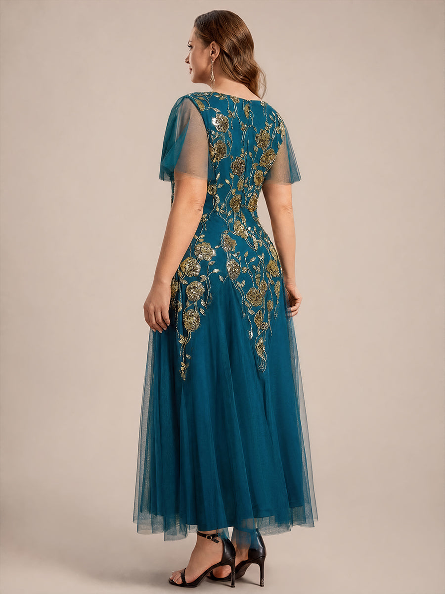 Robe longue à manches courtes en sequins avec volants et décolleté en V #Couleur_Bleu Sarcelle