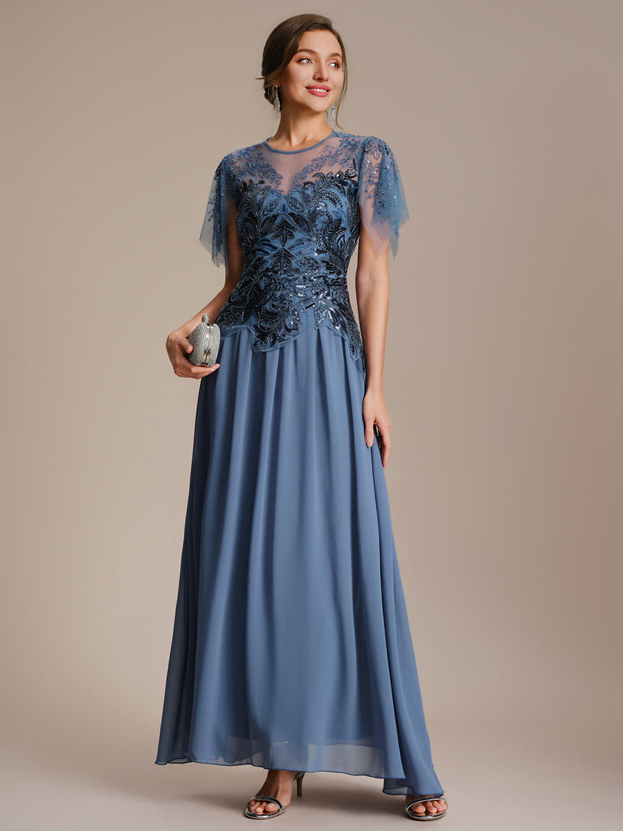 robe longue évasée à manches courtes avec volants sequins et broderies #Couleur_Marine Fume