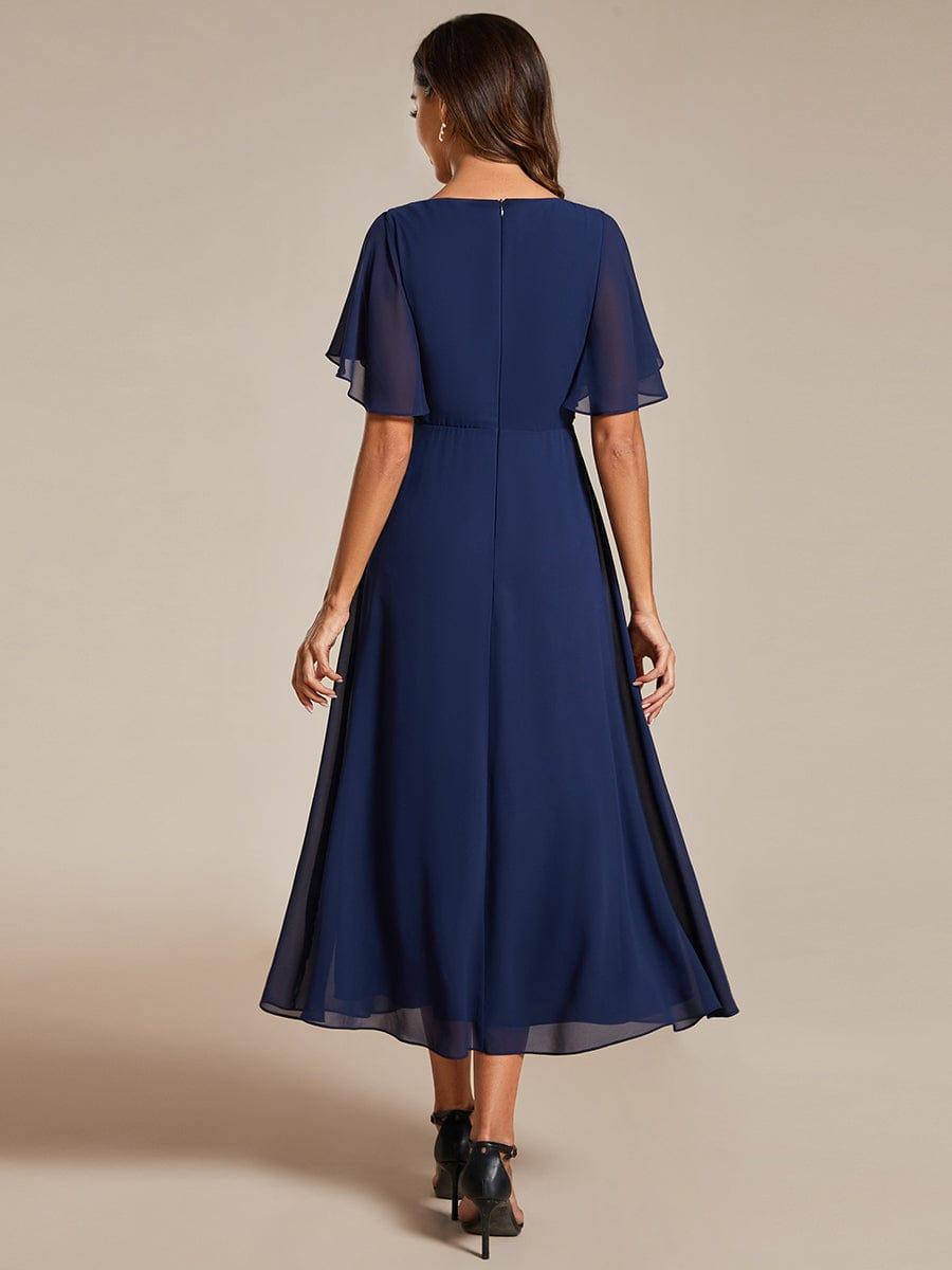 Robe d'invité de mariage mi-longue en mousseline à col en V avec appliques à la taille #Couleur_Bleu Marine