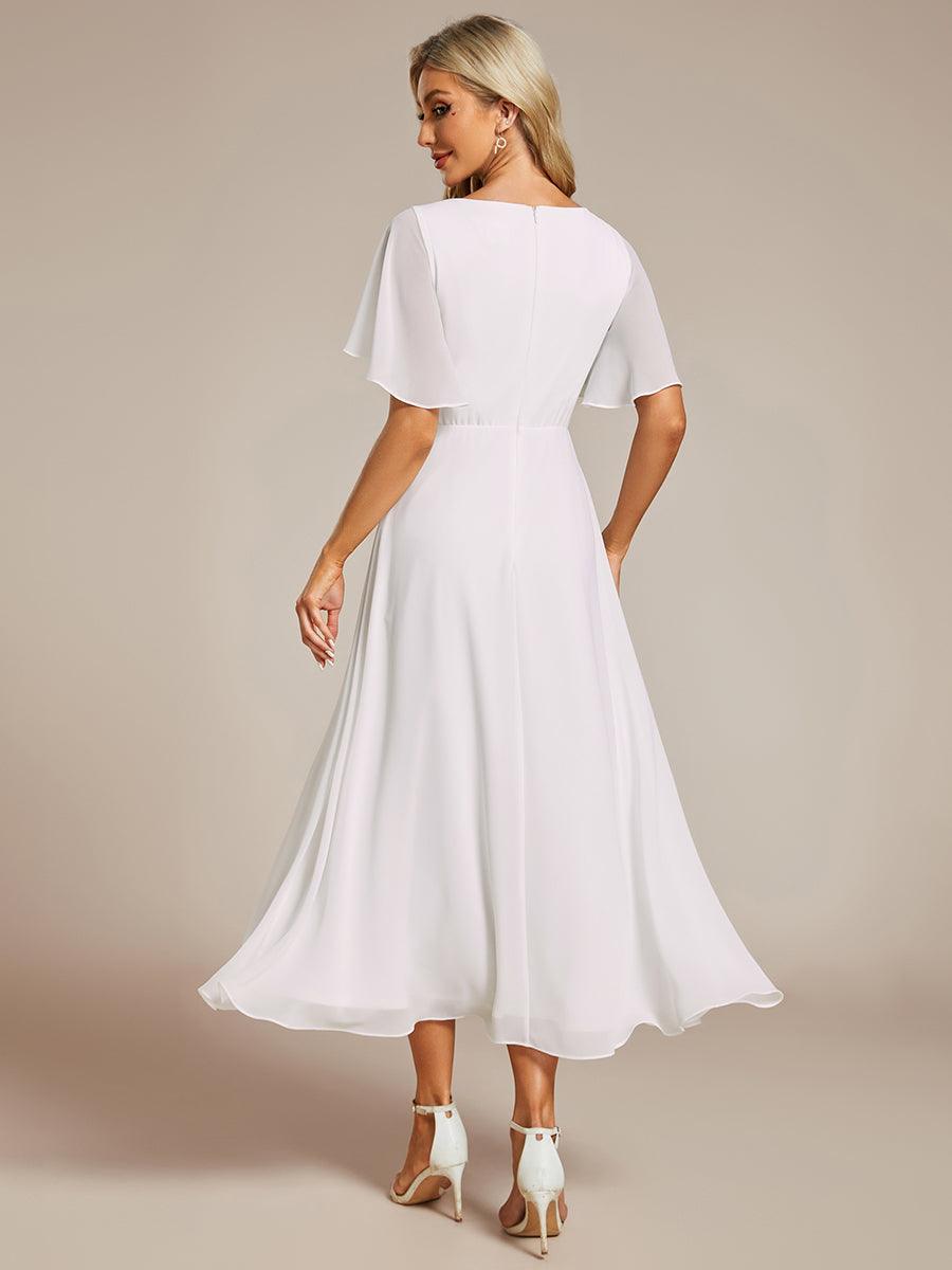 Robe d'invité de mariage mi-longue en mousseline à col en V avec appliques à la taille #Couleur_Blanc