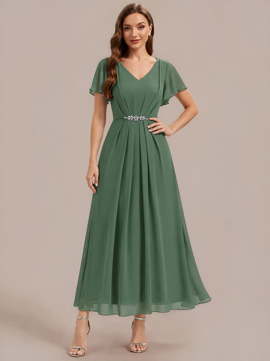 Robe longue maxi ligne A avec manches à volants col en V ornée de strass #Couleur_Eukalyptus Grün