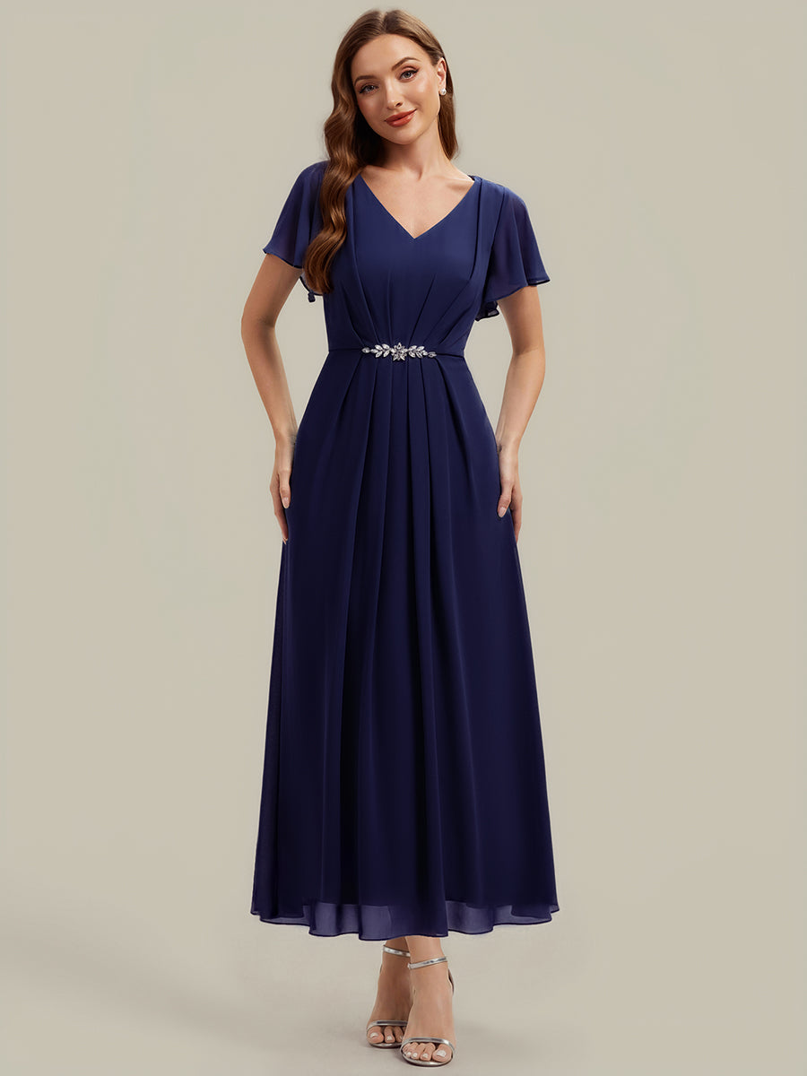 Robe longue maxi ligne A avec manches à volants col en V ornée de strass #Couleur_Bleu Marine