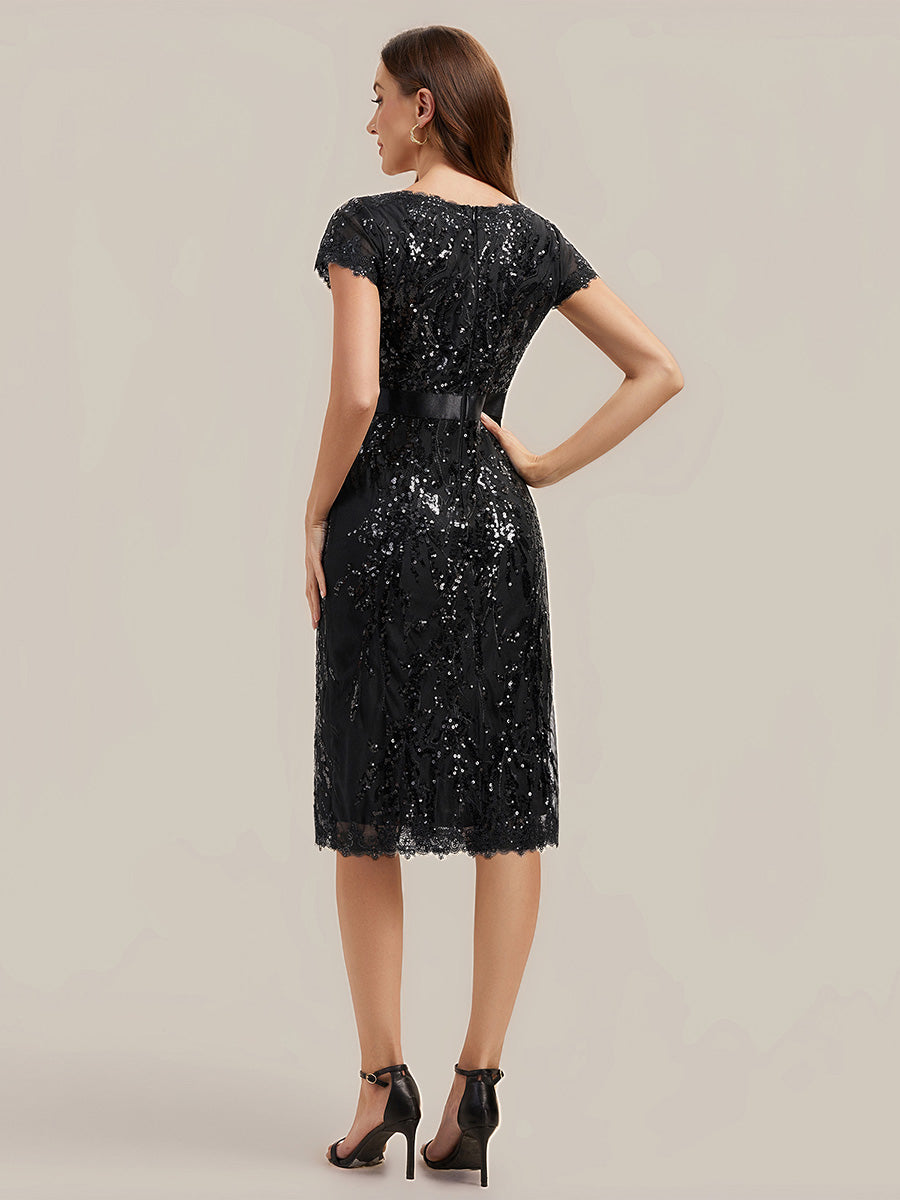 Robe moulante à manches courtes en stretch avec décolleté en V profond et détails en sequins #Couleur_Noir