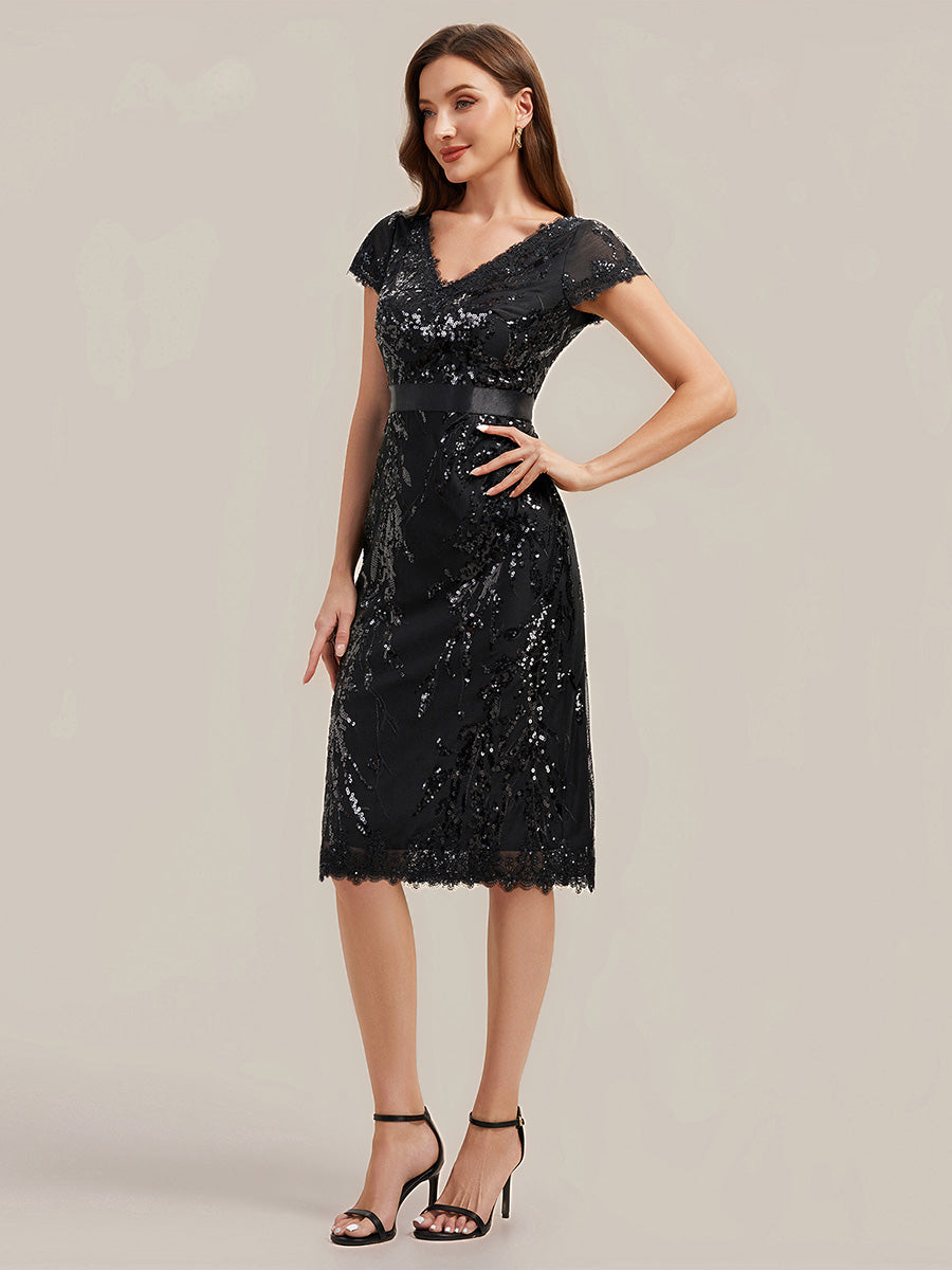 Robe moulante à manches courtes en stretch avec décolleté en V profond et détails en sequins #Couleur_Noir
