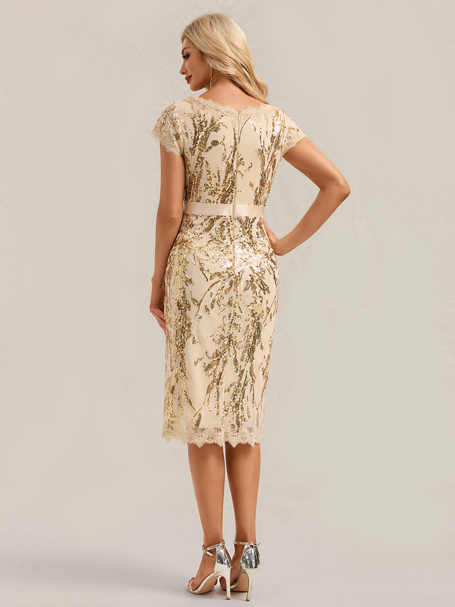 Robe moulante à manches courtes en stretch avec décolleté en V profond et détails en sequins #Couleur_Dorée