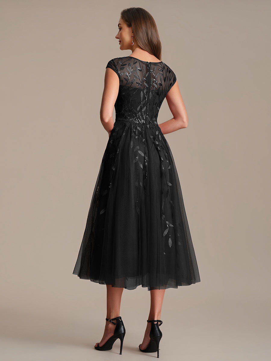 Robe midi évasée à manches courtes en patchwork transparent #Couleur_Noir