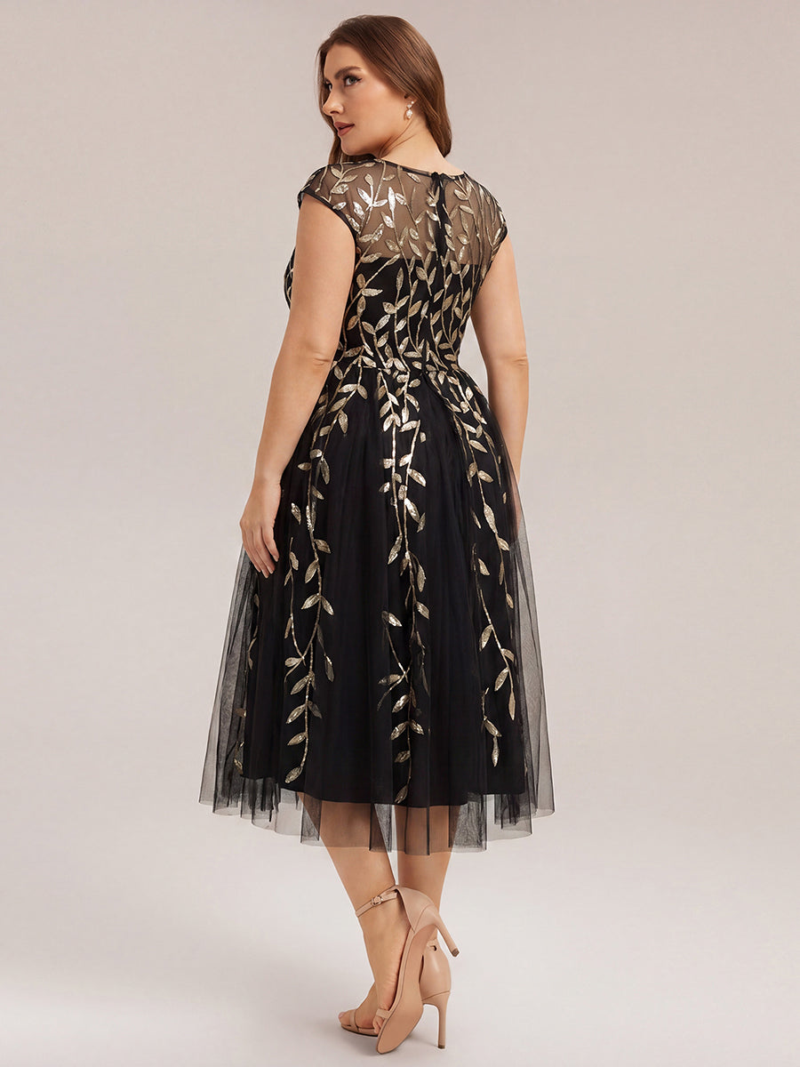 Robe midi évasée à manches courtes en patchwork transparent #Couleur_Noir & Or