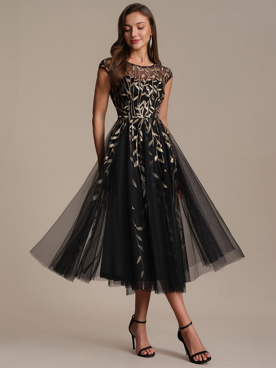 Robe midi évasée à manches courtes en patchwork transparent #Couleur_Noir & Or