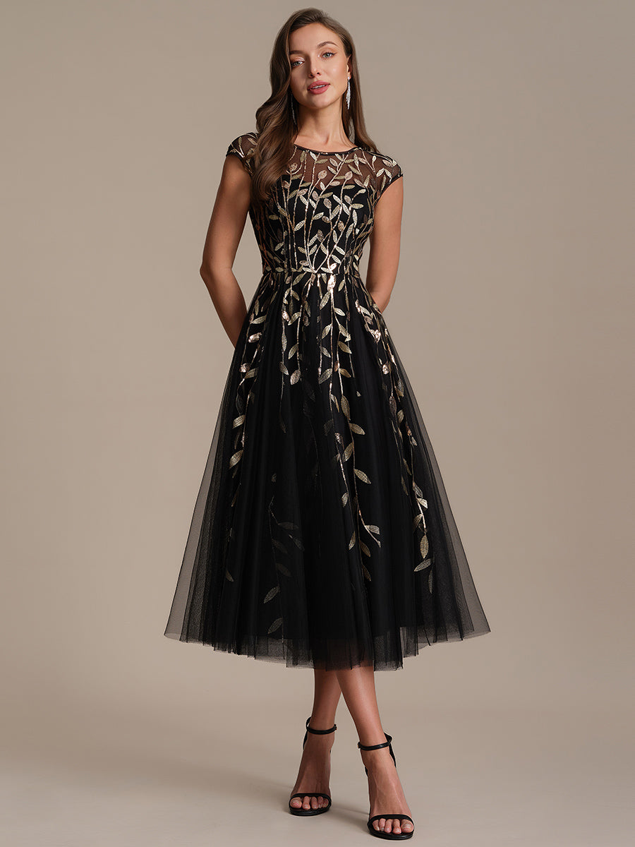 Robe midi évasée à manches courtes en patchwork transparent #Couleur_Noir & Or