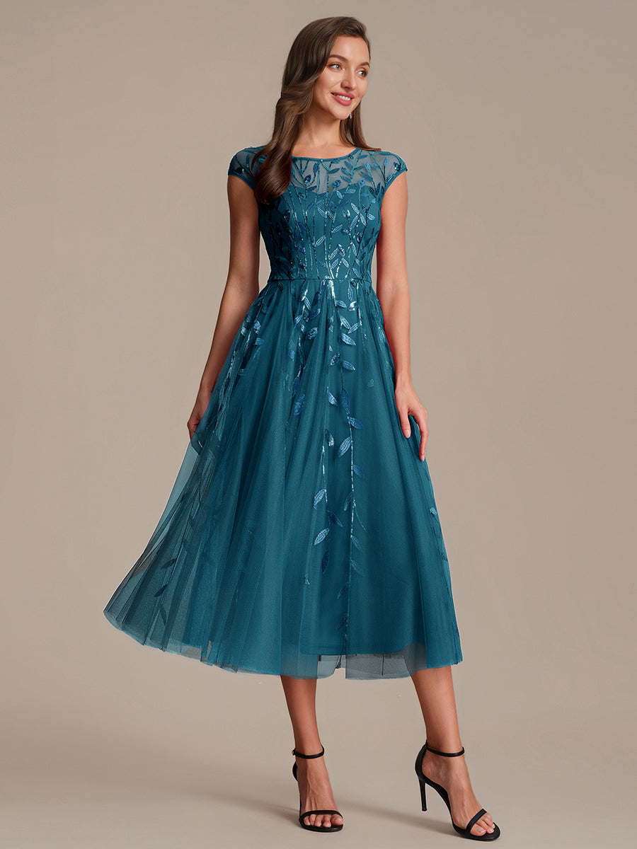 Robe midi évasée à manches courtes en patchwork transparent #Couleur_Bleu Sarcelle