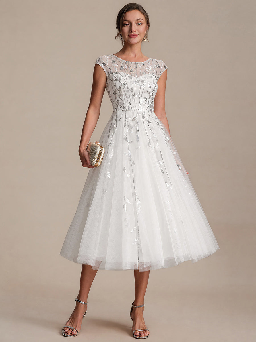 Robe midi évasée à manches courtes en patchwork transparent #Couleur_Blanc