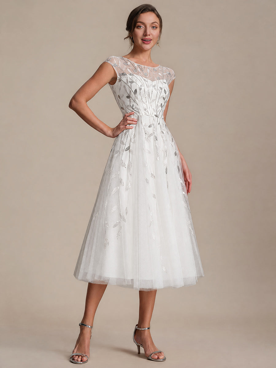 Robe midi évasée à manches courtes en patchwork transparent #Couleur_Blanc