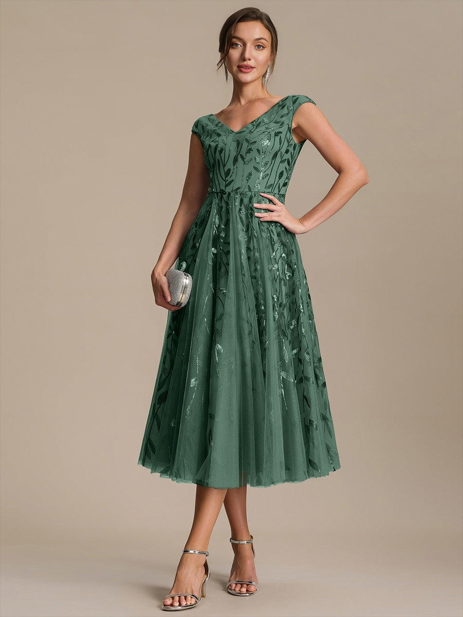 Robe midi sans manches col en V à sequins et coupe évasée #Couleur_Eucalyptus