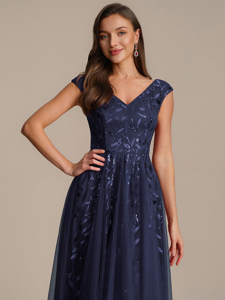 Robe midi sans manches col en V à sequins et coupe évasée #Couleur_Bleu Marine