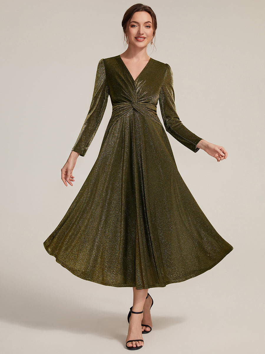 Robe longueur th¨¦ ¨¤ manches longues col crois¨¦ tr¨¨s extensible avec fermeture ¨¦clair au dos et d¨¦tail de n?ud #Couleur_Or métallique