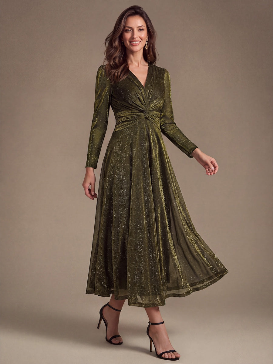Robe longueur th¨¦ ¨¤ manches longues col crois¨¦ tr¨¨s extensible avec fermeture ¨¦clair au dos et d¨¦tail de n?ud #Couleur_Or métallique