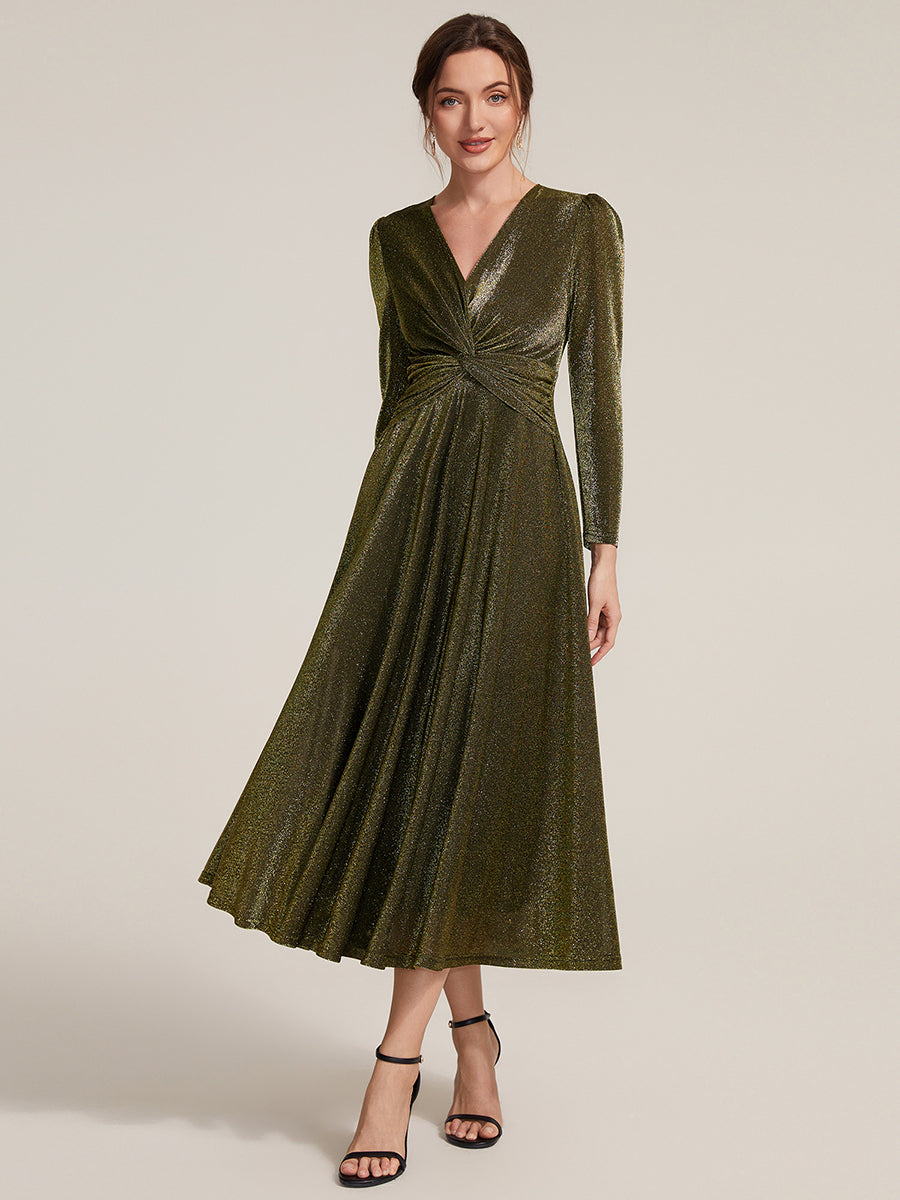 Robe longueur th¨¦ ¨¤ manches longues col crois¨¦ tr¨¨s extensible avec fermeture ¨¦clair au dos et d¨¦tail de n?ud #Couleur_Or métallique