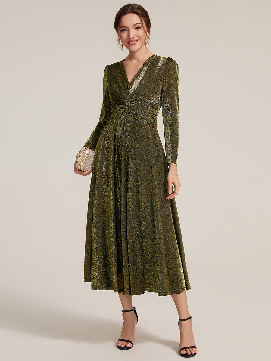 Robe longueur th¨¦ ¨¤ manches longues col crois¨¦ tr¨¨s extensible avec fermeture ¨¦clair au dos et d¨¦tail de n?ud #Couleur_Or métallique