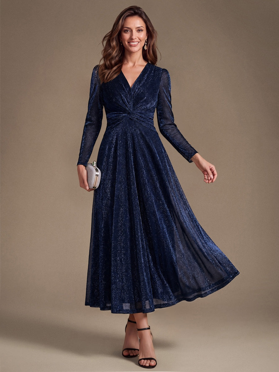 Robe longueur th¨¦ ¨¤ manches longues col crois¨¦ tr¨¨s extensible avec fermeture ¨¦clair au dos et d¨¦tail de n?ud #Couleur_Bleu Marine