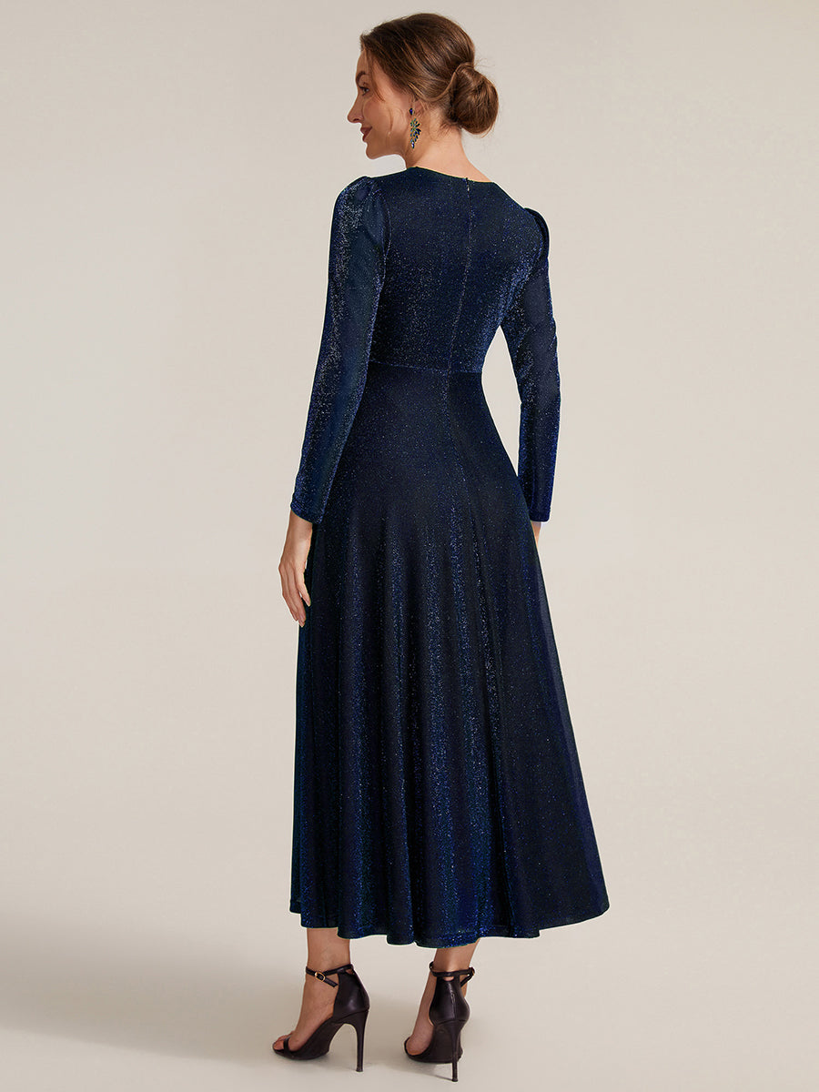 Robe longueur th¨¦ ¨¤ manches longues col crois¨¦ tr¨¨s extensible avec fermeture ¨¦clair au dos et d¨¦tail de n?ud #Couleur_Bleu Marine