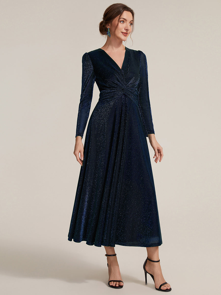 Robe longueur th¨¦ ¨¤ manches longues col crois¨¦ tr¨¨s extensible avec fermeture ¨¦clair au dos et d¨¦tail de n?ud #Couleur_Bleu Marine