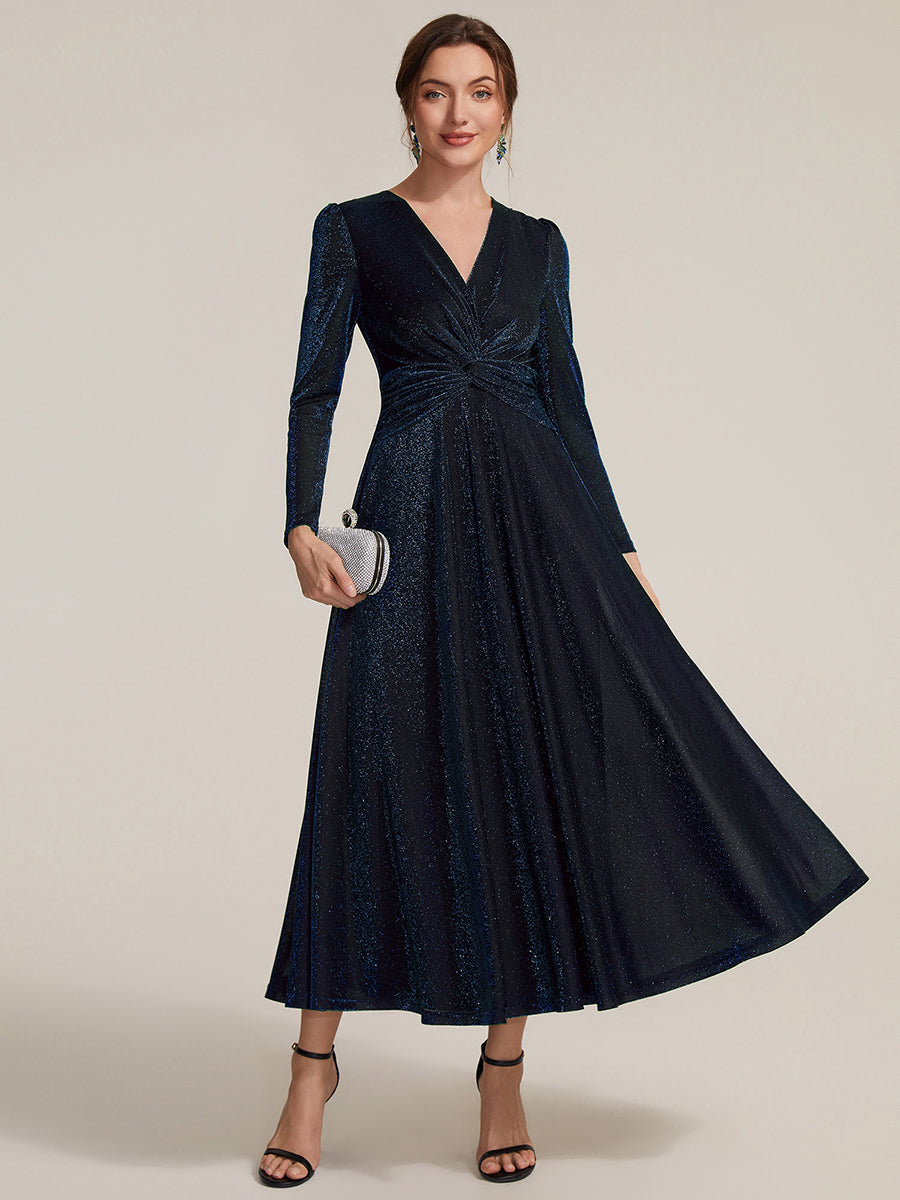 Robe longueur th¨¦ ¨¤ manches longues col crois¨¦ tr¨¨s extensible avec fermeture ¨¦clair au dos et d¨¦tail de n?ud #Couleur_Bleu Marine