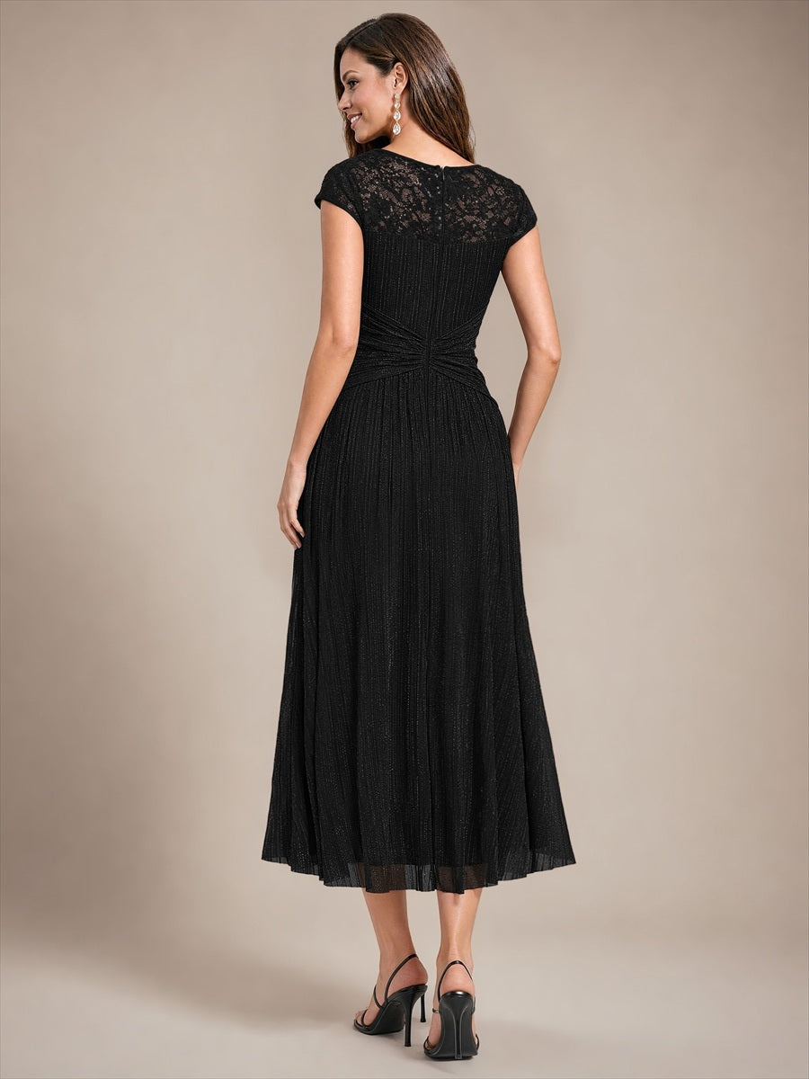 Robe midi à manches courtes col rond avec coupe évasée et tissu extensible #Couleur_Noir