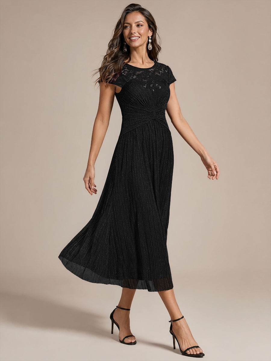 Robe midi à manches courtes col rond avec coupe évasée et tissu extensible #Couleur_Noir