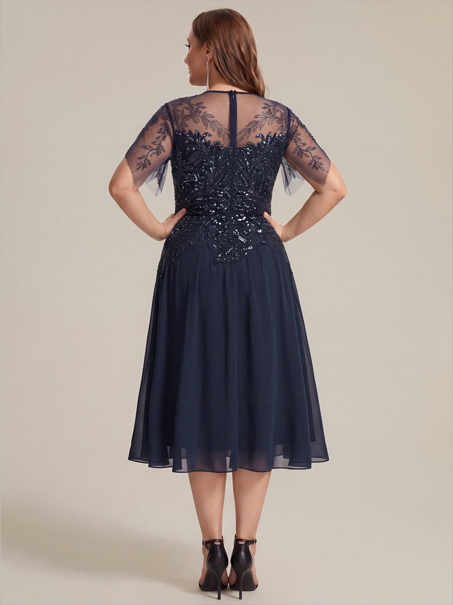 Robe midi A ligne à manches courtes en sequins avec col rond et volants #Couleur_Bleu Marine