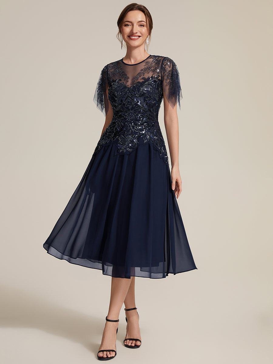 Robe midi A ligne à manches courtes en sequins avec col rond et volants #Couleur_Bleu Marine