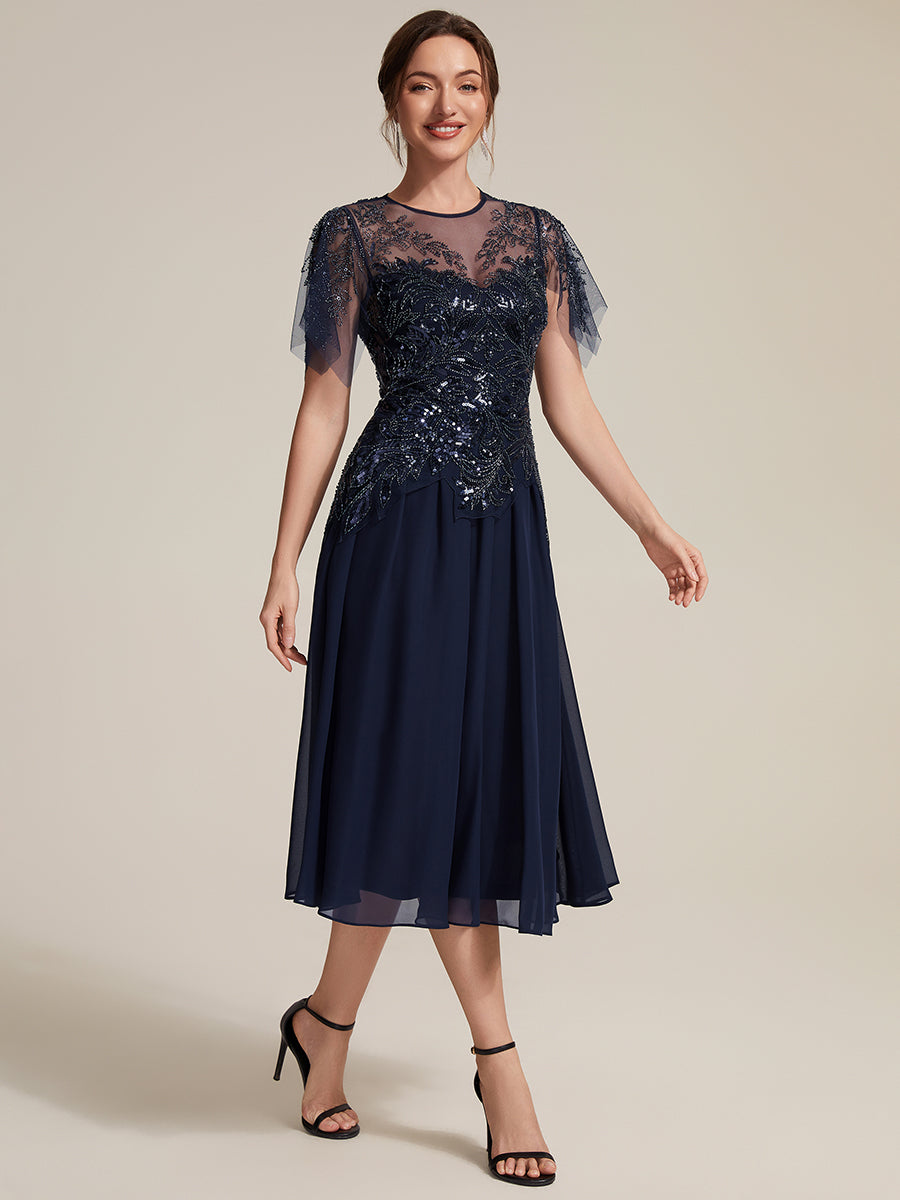 Robe midi A ligne à manches courtes en sequins avec col rond et volants #Couleur_Bleu Marine