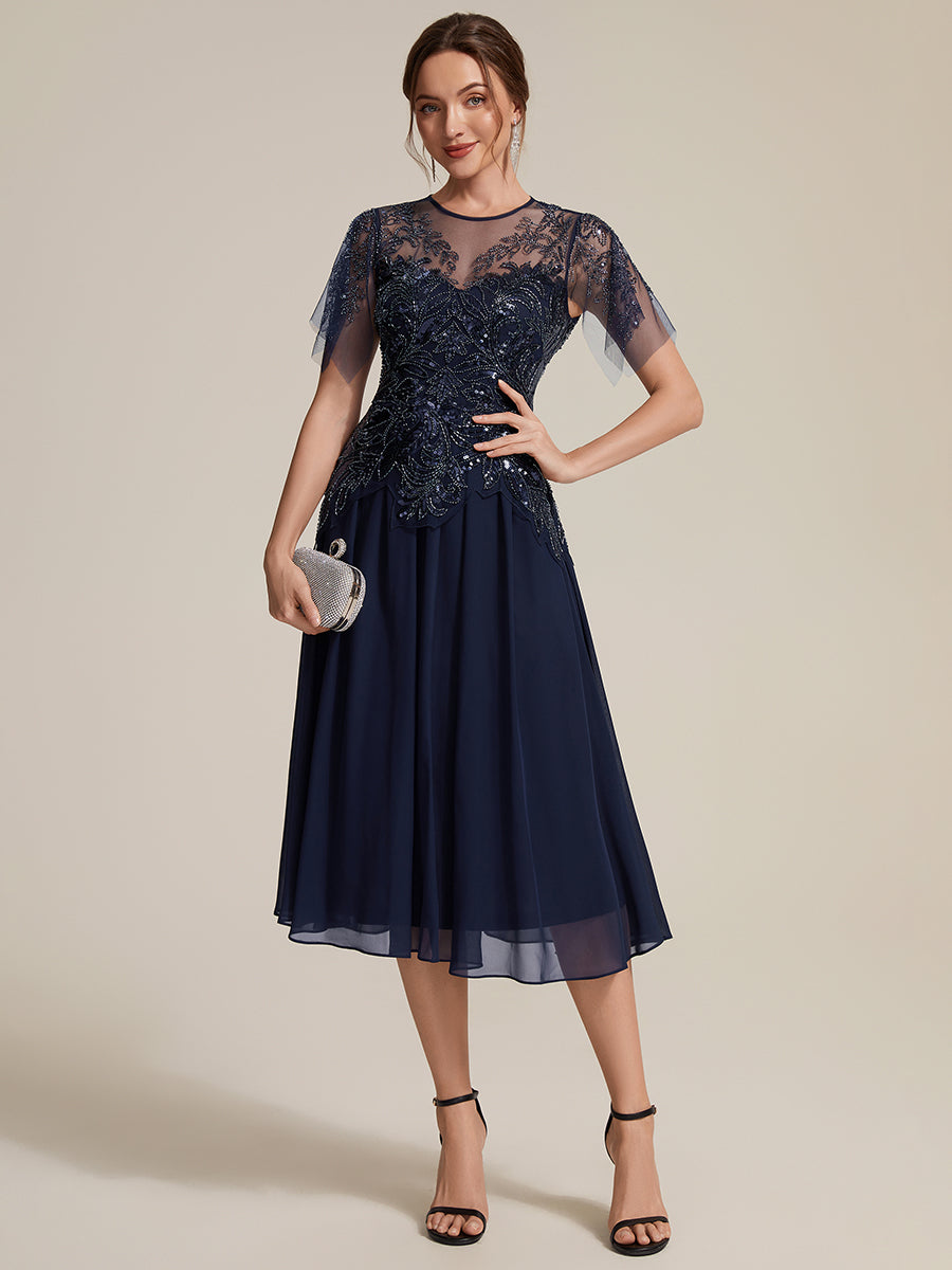 Robe midi A ligne à manches courtes en sequins avec col rond et volants #Couleur_Bleu Marine