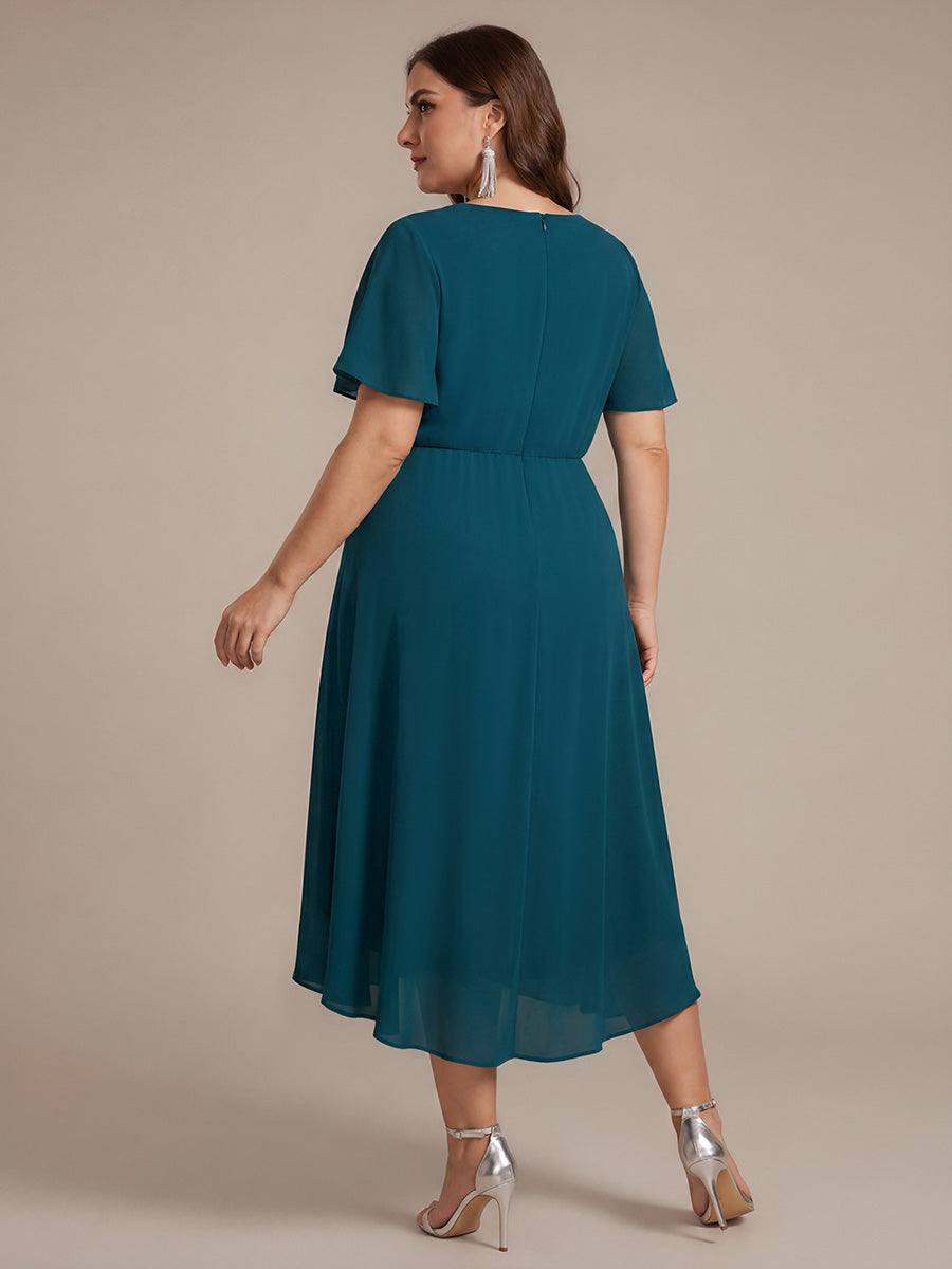 robe Aline ¨¤ manches courtes en V avec ourlet asym¨¦trique et manches volantes fermeture ¨¦clair au dos #Couleur_Bleu Sarcelle