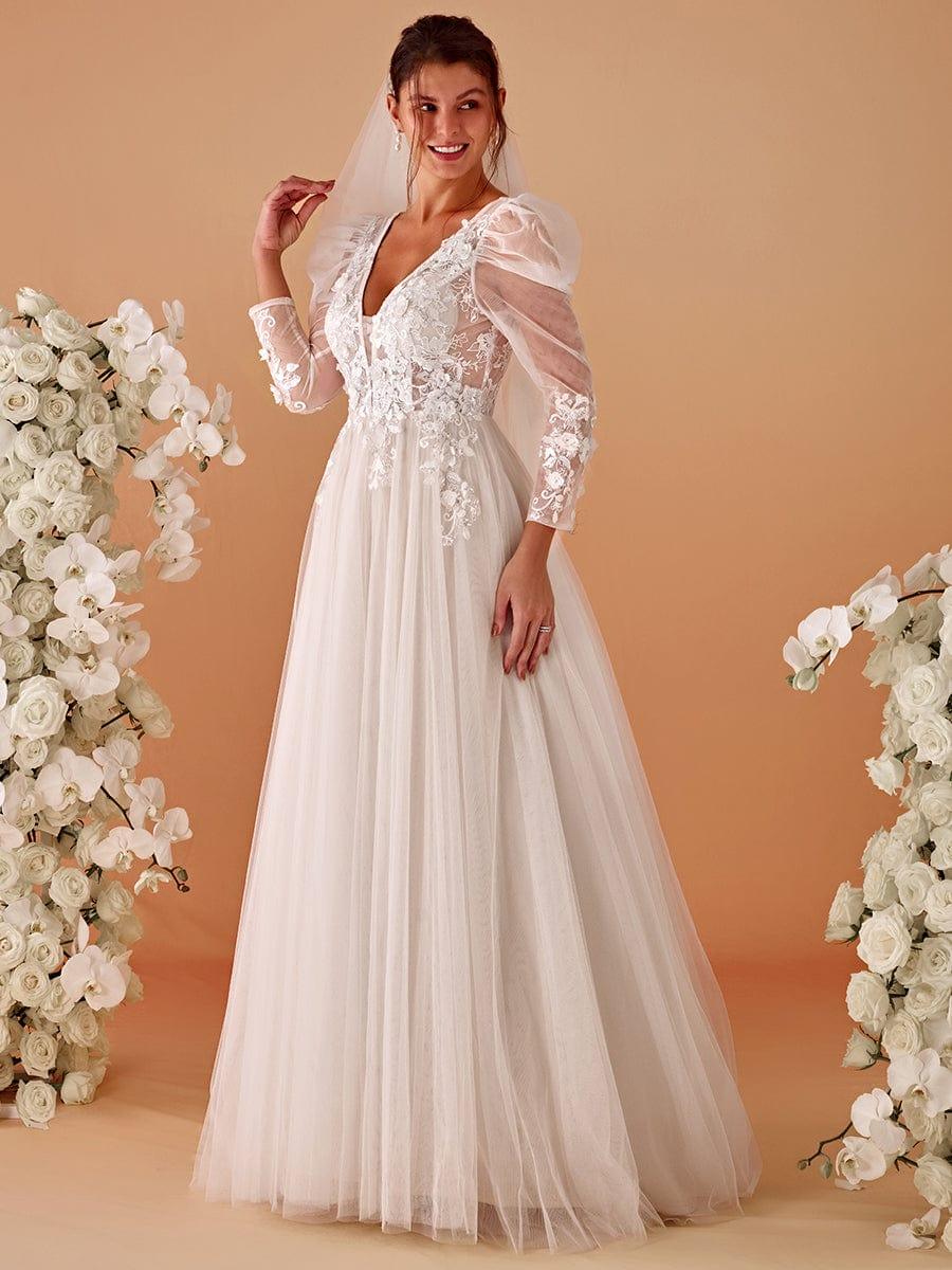 Robe de mariée transparente à col en V et manches gigot #Couleur_Ivoire