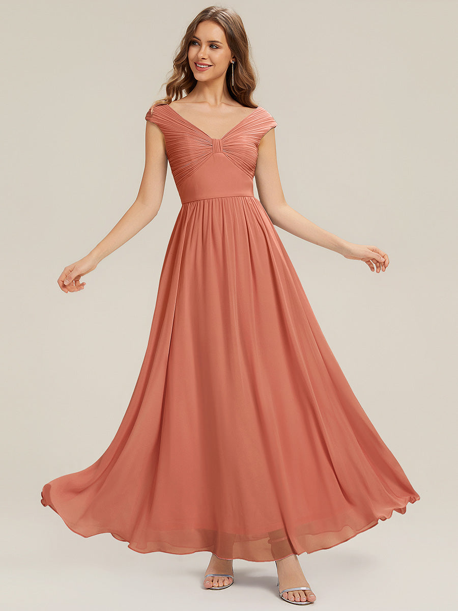 Robe longue sans manches décolletée en V avec une taille haute et des détails plissés #Couleur_Rose Corail