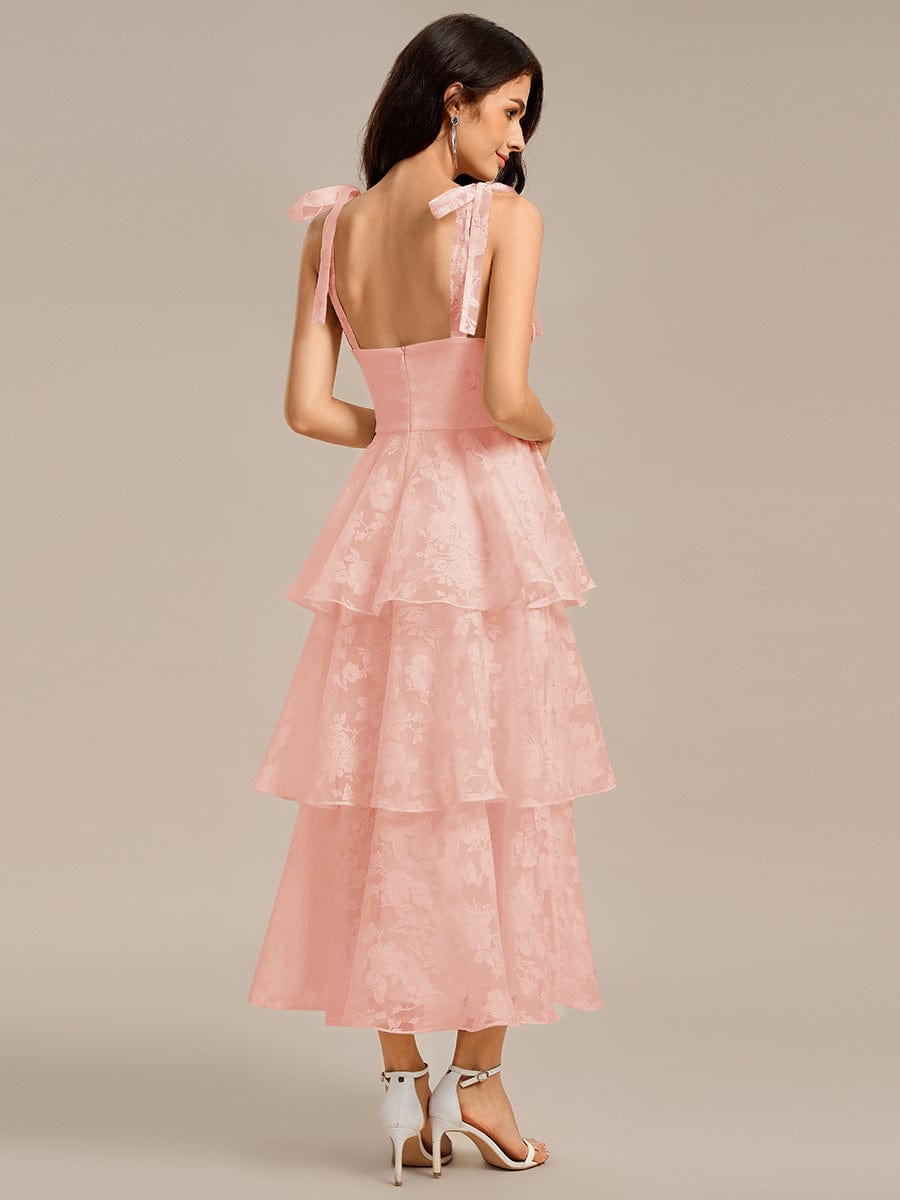 Robe de mariée mi-longue à volants et bustier à bretelles nouées et à fleurs #Couleur_Rose