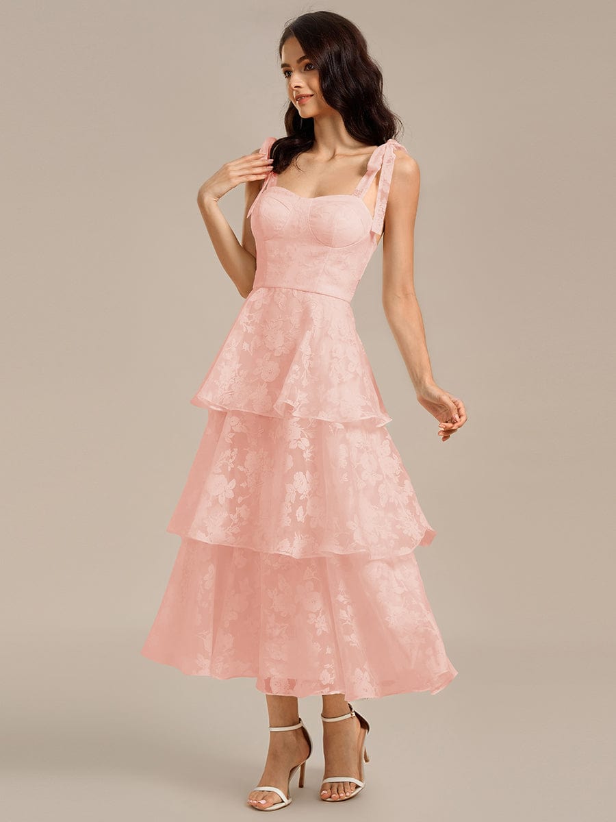 Robe de mariée mi-longue à volants et bustier à bretelles nouées et à fleurs #Couleur_Rose