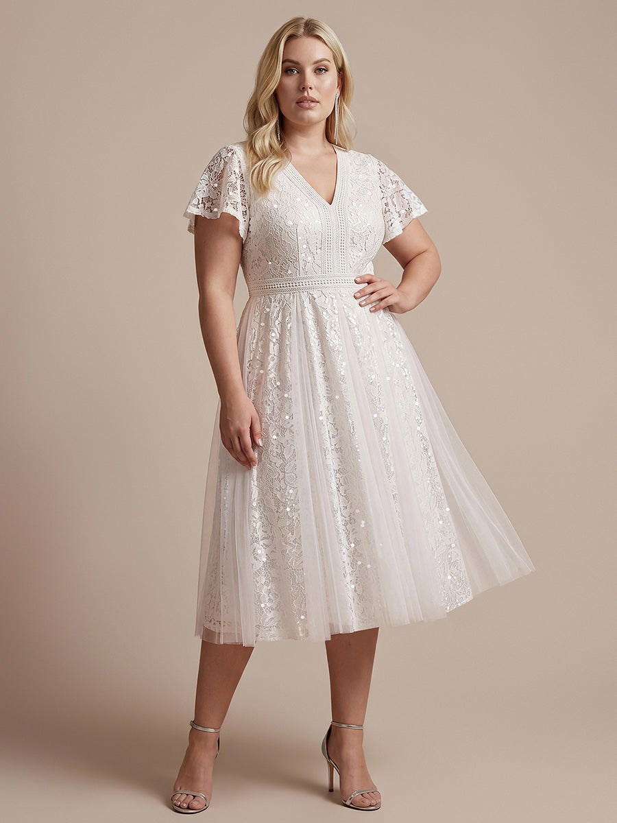 robe midi évasée en tulle avec manches courtes décolleté en V et volants #Couleur_Blanc