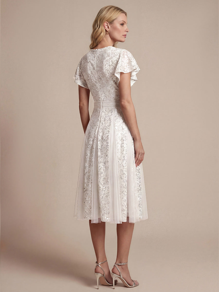 robe midi évasée en tulle avec manches courtes décolleté en V et volants #Couleur_Blanc