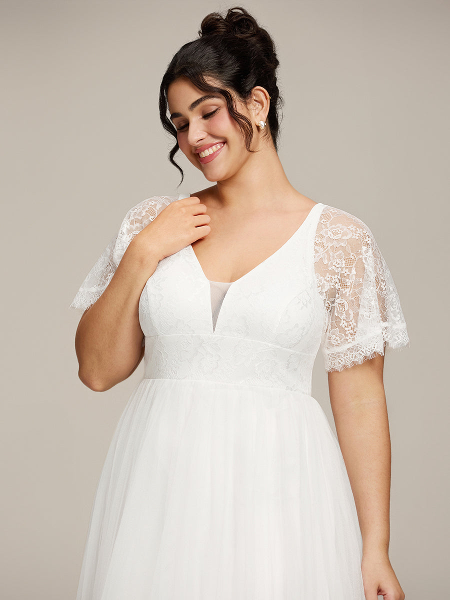 Robe de mariée en tulle avec col en V et manches plissées #color_Blanc