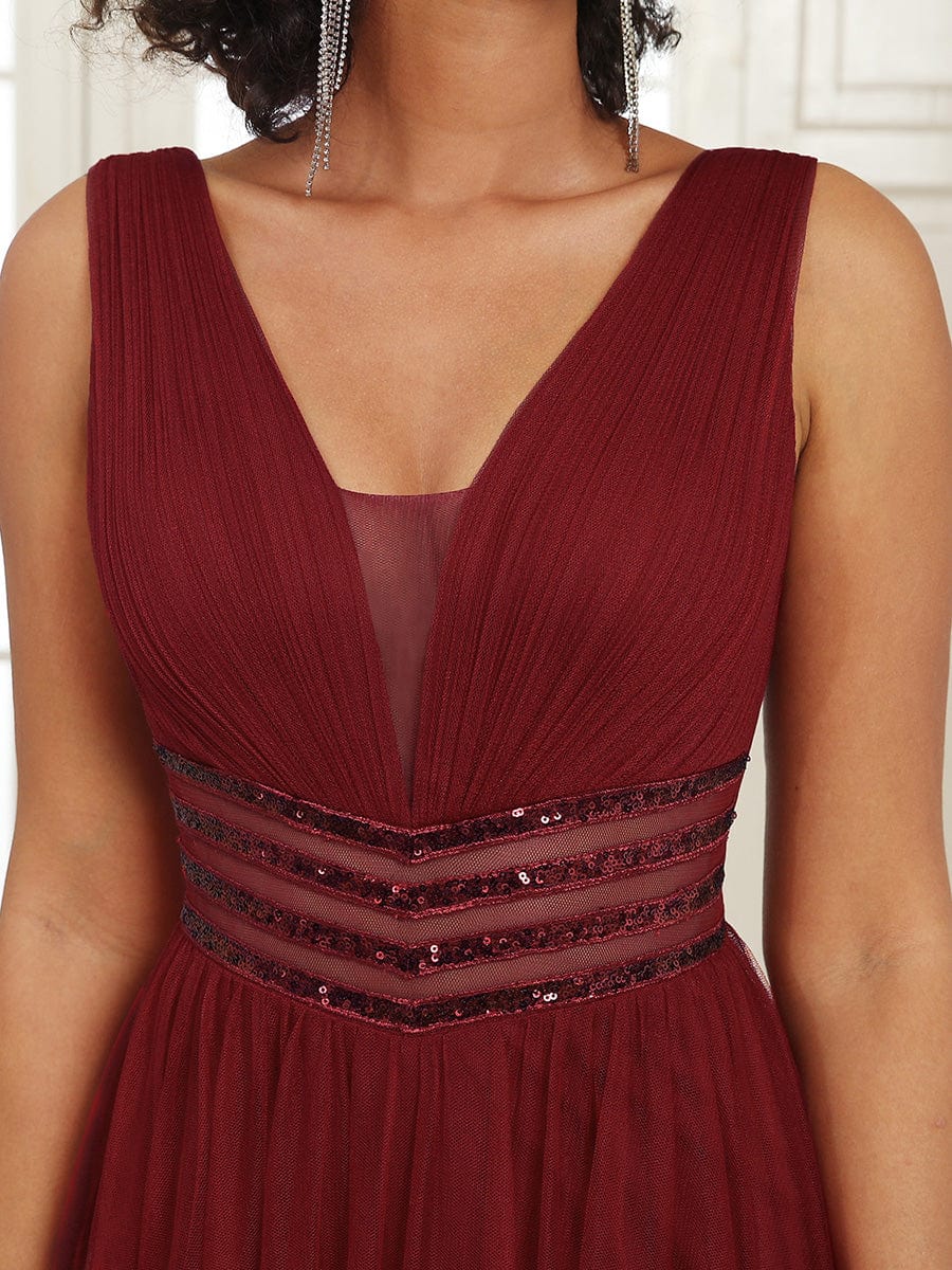 Robe de soirée longue à sequins et col en V sans manches #Couleur_Bordeaux Robe de soirée longue à sequins et col en V sans manches