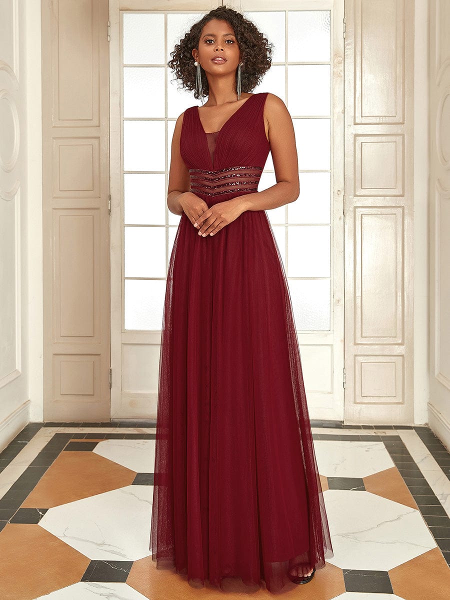 Robe de soirée longue à sequins et col en V sans manches #Couleur_Bordeaux Robe de soirée longue à sequins et col en V sans manches